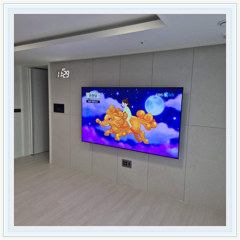 관악 봉천 신림 타일 벽면 하중 점검 관련 설치 참고 사진 3 · 화면 하단과 거실장 사이의 간격을 맞추는 기준